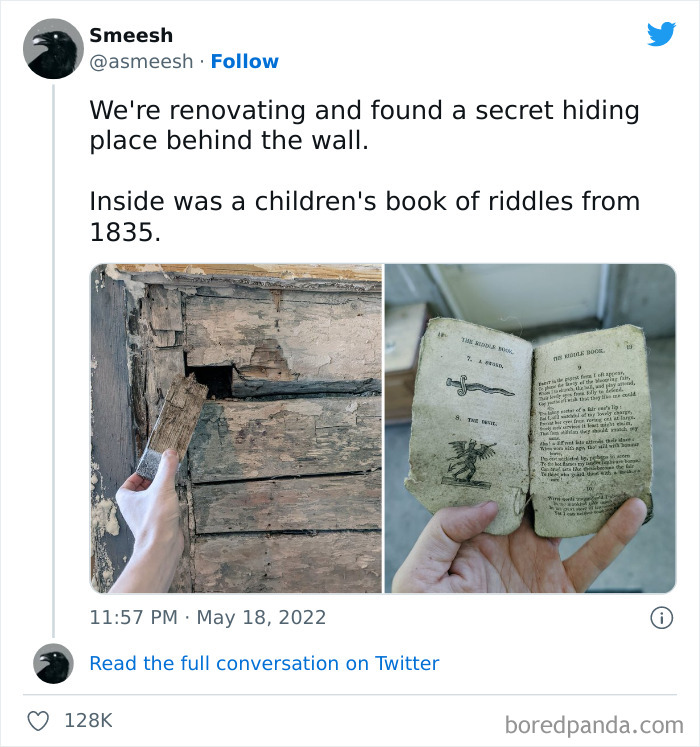 Hand pulling a wooden panel to reveal a hidden compartment with a 1835 children's book in an old house.