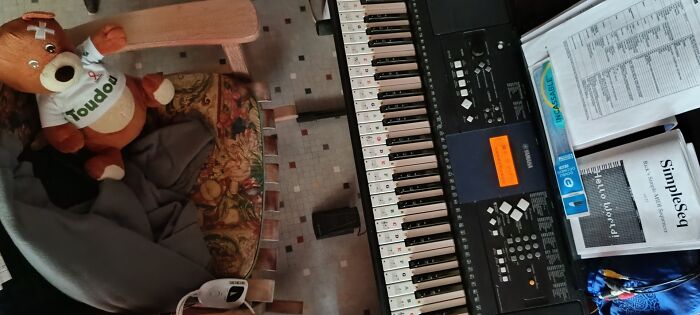 How I Unwind; I Suck At Playing Piano But Since I Live Alone I'm The Only One Who Has To Hear It. Yes, It's A Rocking Chair, And A Little Heated Blanket. ;)