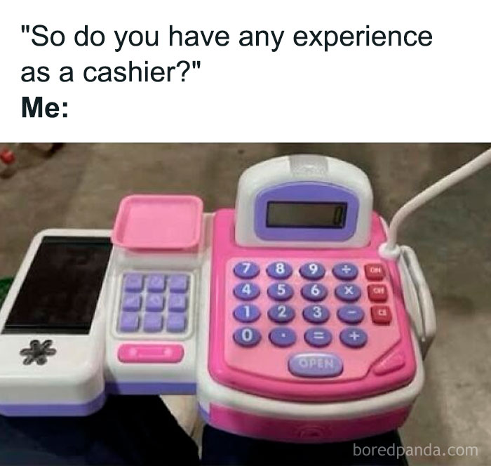 Child’s toy cash register with pink and purple buttons, evoking nostalgic memories of the good old days.