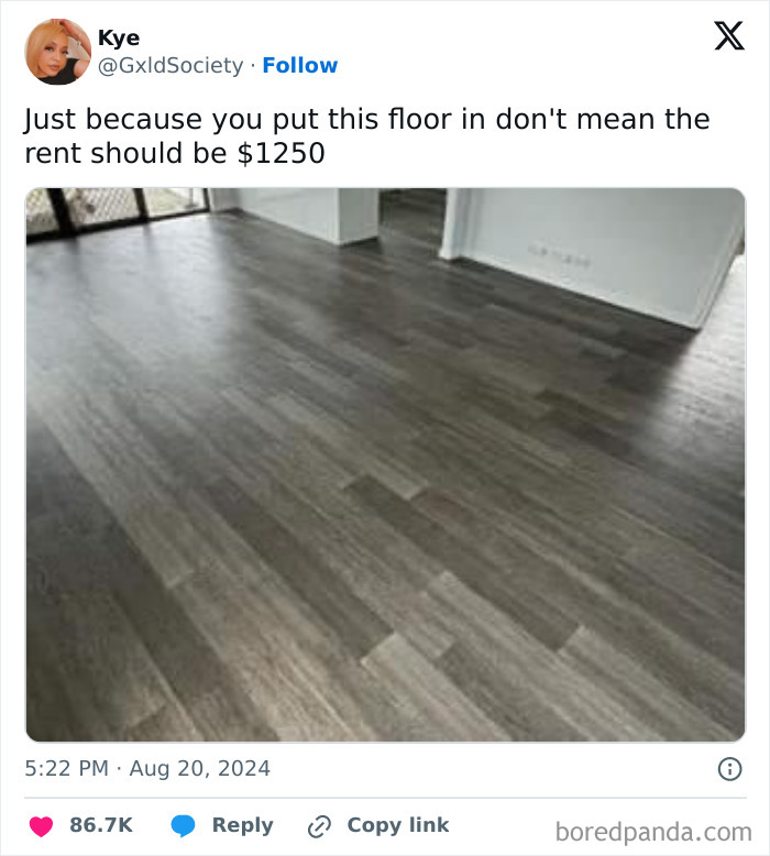 Grey laminate flooring in a kitchen with caption about rent prices, relatable memes for a laugh today.