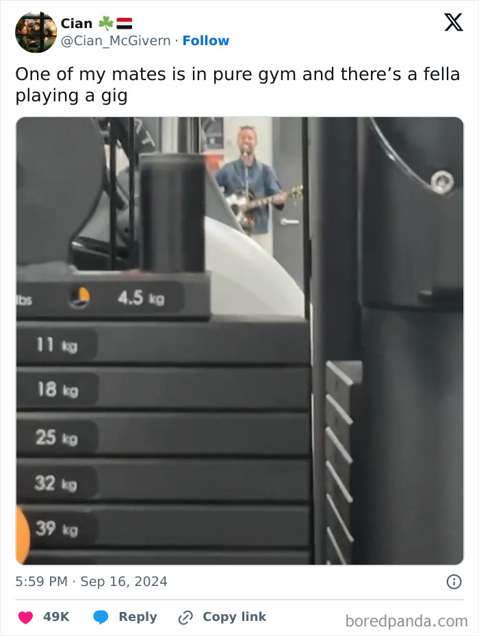 Man playing guitar in a crowded gym, illustrating one of the annoying gym moments many runners would avoid.