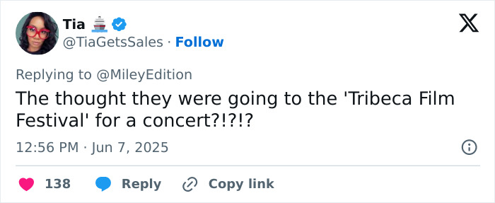 Screenshot of a Twitter reply expressing fans&rsquo; disappointment expecting a concert at Miley Cyrus video premiere event.