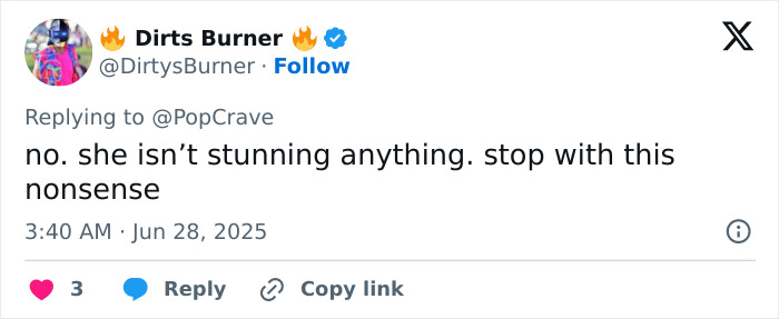 Screenshot of a tweet replying to PopCrave, discussing Katy Perry&rsquo;s message after breakup with Orlando Bloom.