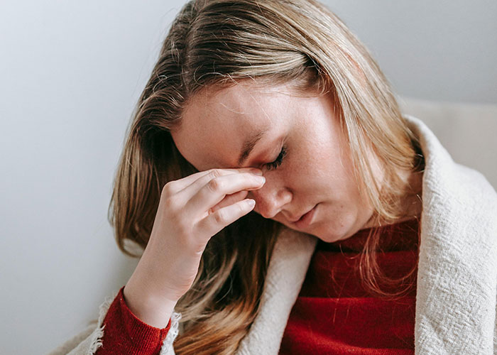 Woman feeling stressed and frustrated after neighbor says no to babysitting request from a stay at home mom