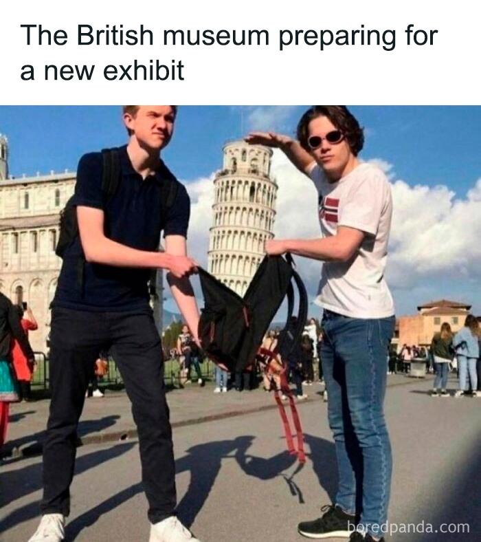Two young men humorously pose with a backpack aligning with the Leaning Tower, in history memes about the past.
