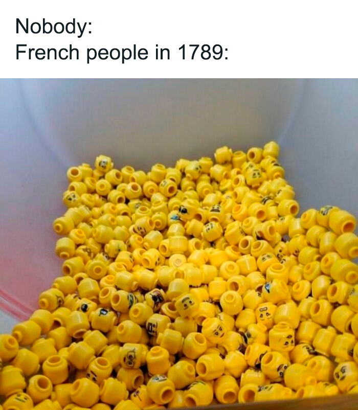Heap of yellow LEGO heads with various facial expressions, humorously referencing history memes about the past.