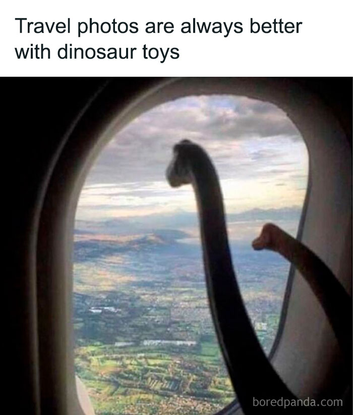 Travel view from airplane window with dinosaur toys creating a funny meme to lighten a hard day.