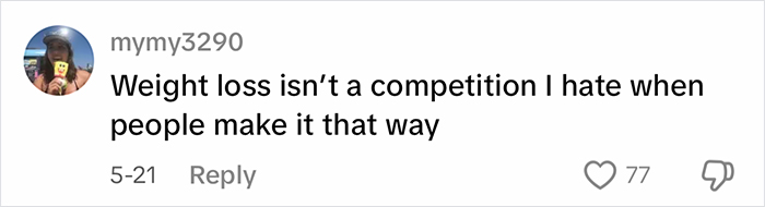 Comment about weight loss not being a competition, posted by a user on a social media platform. Comment about weight loss not being a competition, posted by a user on a social media platform.