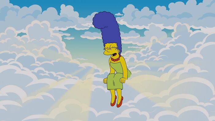 Marge Simpson floating among clouds, symbolizing her death and emotional impact on animated character deaths.