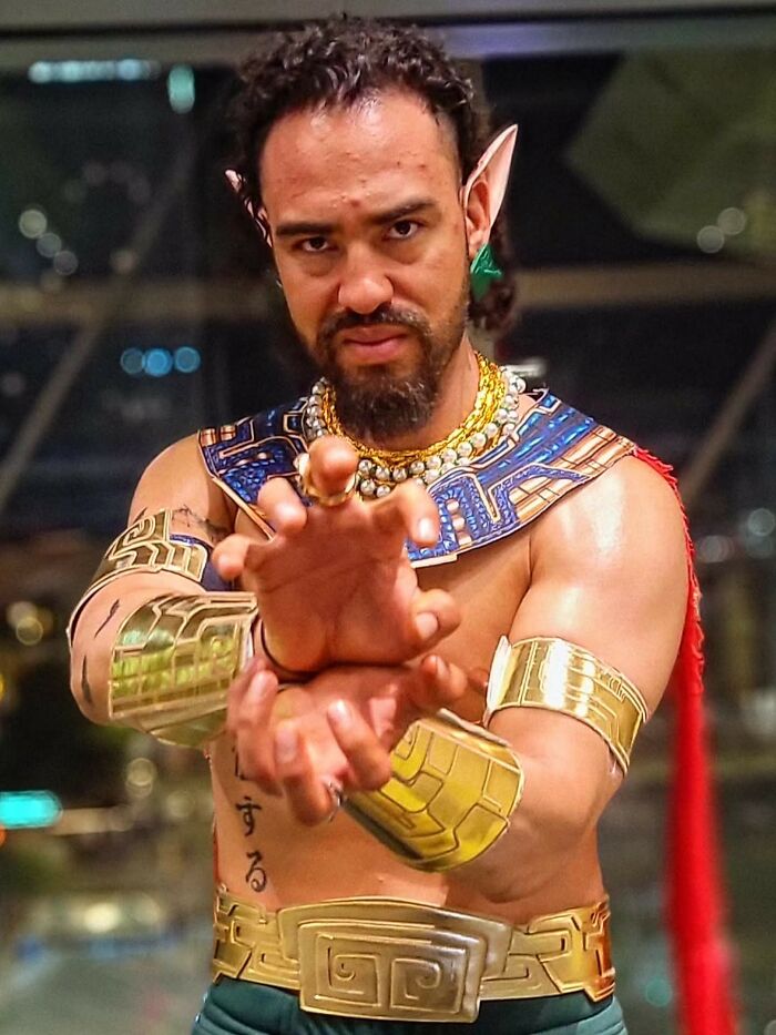 Man in fantasy warrior costume reaching out, representing people who don’t fully relate to Millennials or Gen Z.