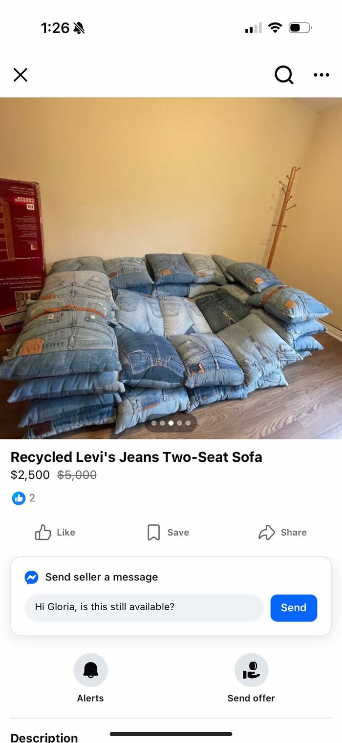 Two-seat sofa made from recycled Levi's jeans cushions in a minimal room, showcasing a DIY craft shaming project.