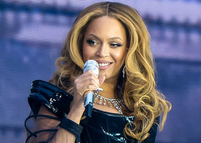 Female singer with long blonde hair holding a microphone, representing what celebrities were doing before fame found them.