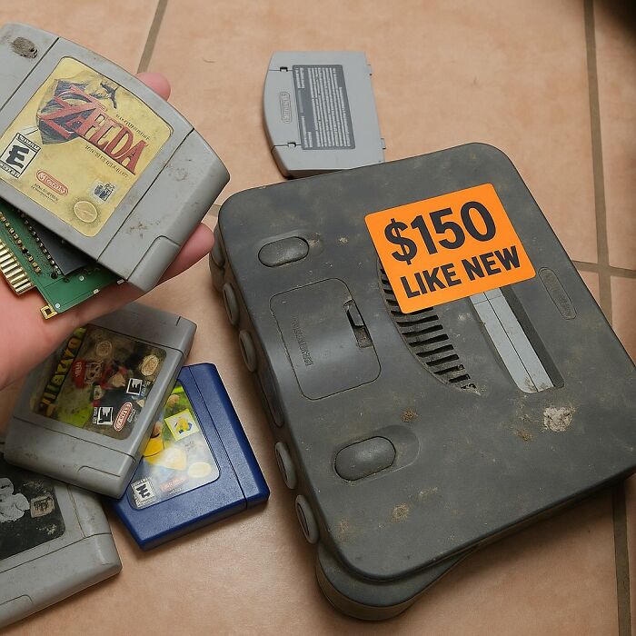 Used vintage Nintendo 64 console and game cartridges, a cool secondhand find with a $150 like new price tag.