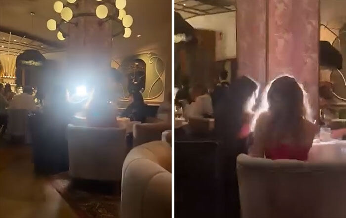 Two images showing influencers using bright phone lights in a dim restaurant, capturing unhinged moments for views.