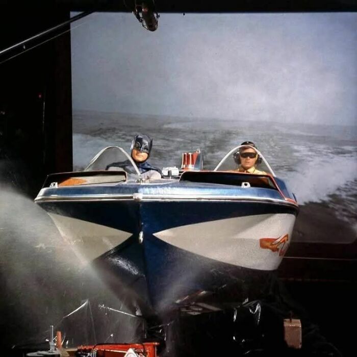Vintage behind-the-scenes photo showing a Batboat replica in action, highlighting fascinating historical photos impact.