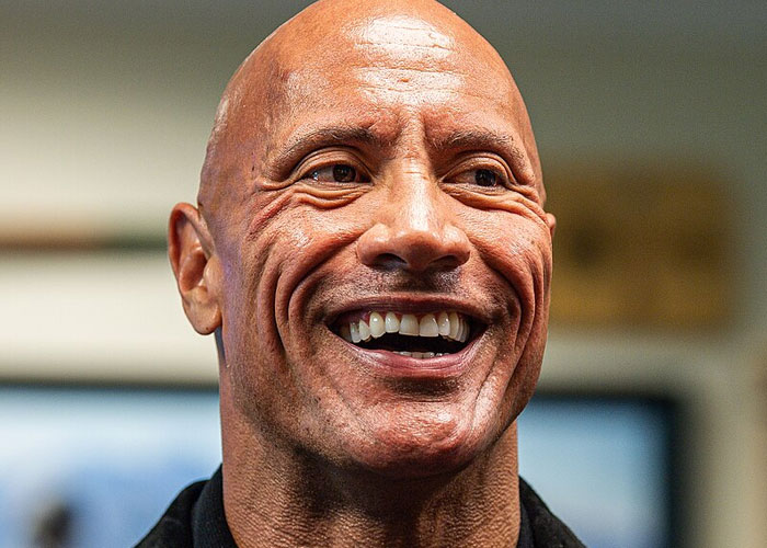 Close-up of a smiling celebrity showcasing what 40 celebrities were doing before fame found them in candid moment.