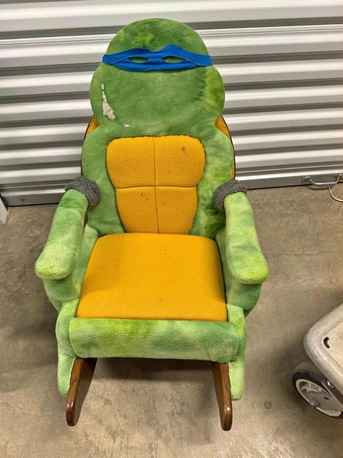 Vintage plush rocking chair shaped like a Teenage Mutant Ninja Turtle, a cool secondhand find for collectors.