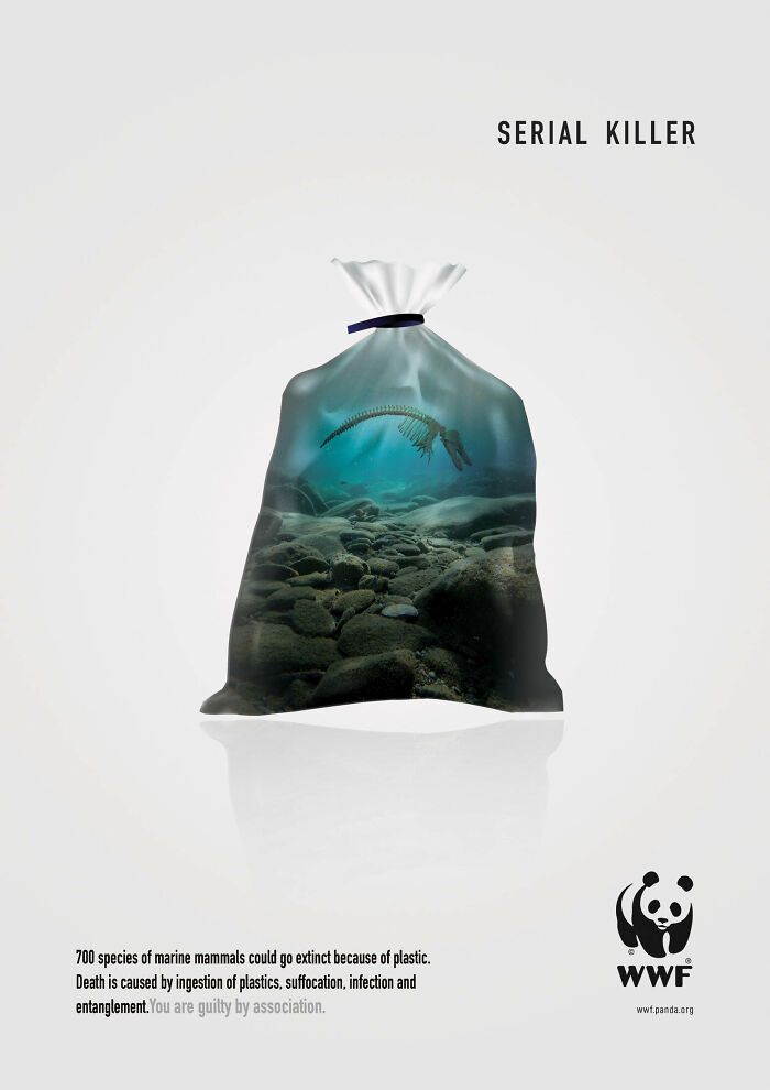 Plastic trash bag showing underwater scene with marine mammal skeleton highlighting powerful WWF environmental ad.