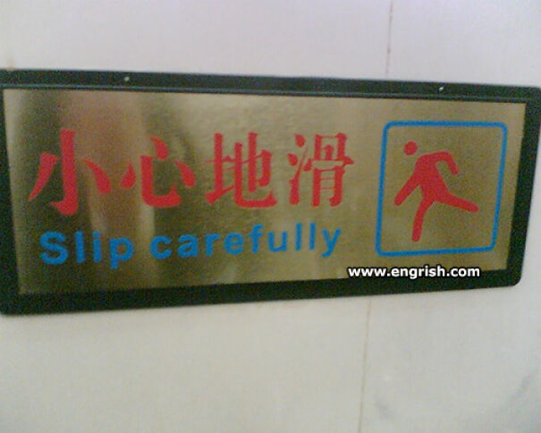 Sign with Chinese characters and the funny English translation slip carefully, illustrating baffling uses of English.