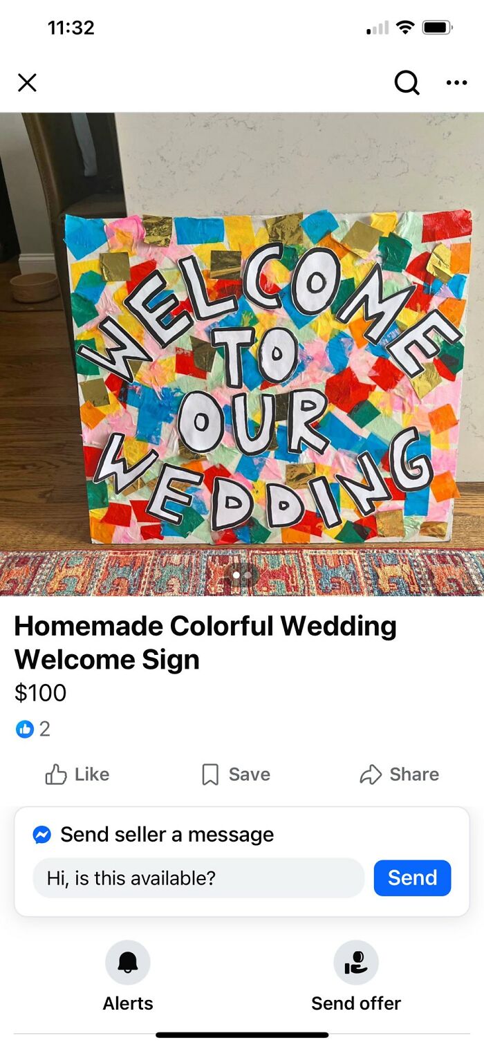 Homemade colorful DIY wedding welcome sign with bold letters and multicolored paper pieces on a wooden floor.