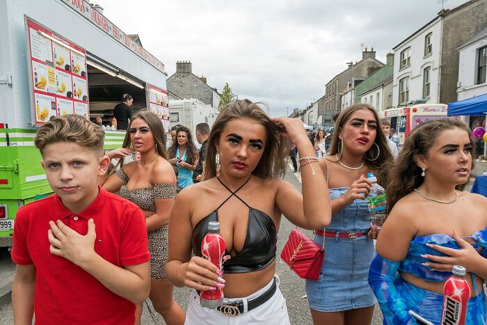 Group of young people on a street in modern Ireland, showcasing life on the margins in vibrant, raw moments.