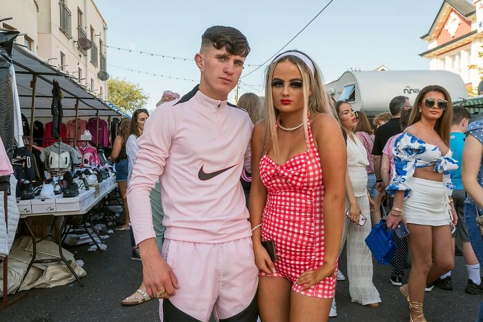 Young people posing on a busy street market, capturing raw and beautiful life on the margins of modern Ireland.
