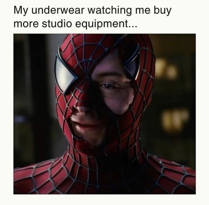 Spider-Man mask pulled aside to reveal a smirking face with caption about underwear watching more studio equipment buys, funny work meme.