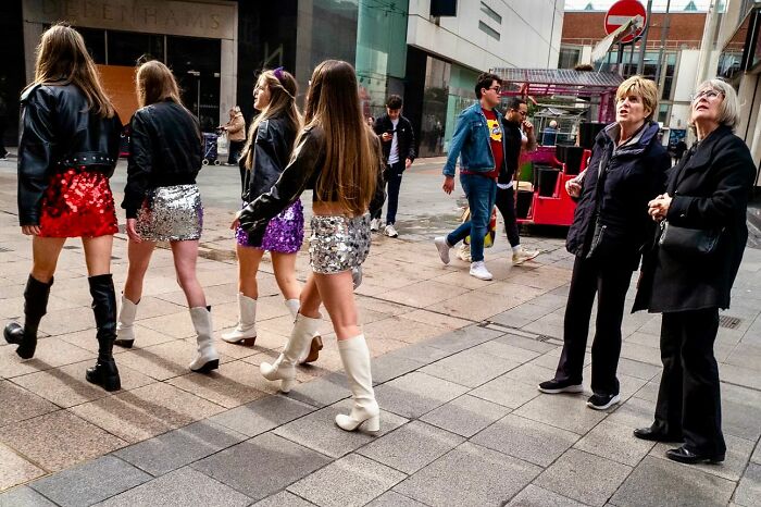 Candid street photos capturing diverse pedestrians with vibrant outfits and natural city life moments in an urban setting.