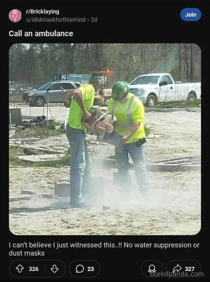 Two men wearing bright shirts cutting concrete without water suppression or dust masks, showing risky behavior.
