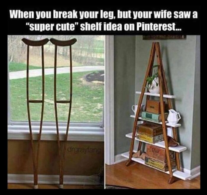 Pair of wooden crutches repurposed into a DIY shelf with boards, showcasing a craft shaming project gone wrong.