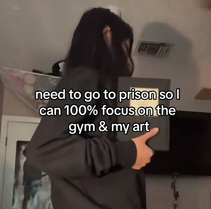 Person holding a book with text overlay expressing a desire to focus on gym and art, funny meme about therapy costs.