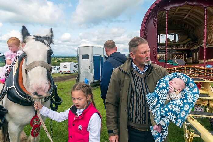 A family with children and horse at a rural gathering, capturing life on the margins of modern Ireland.