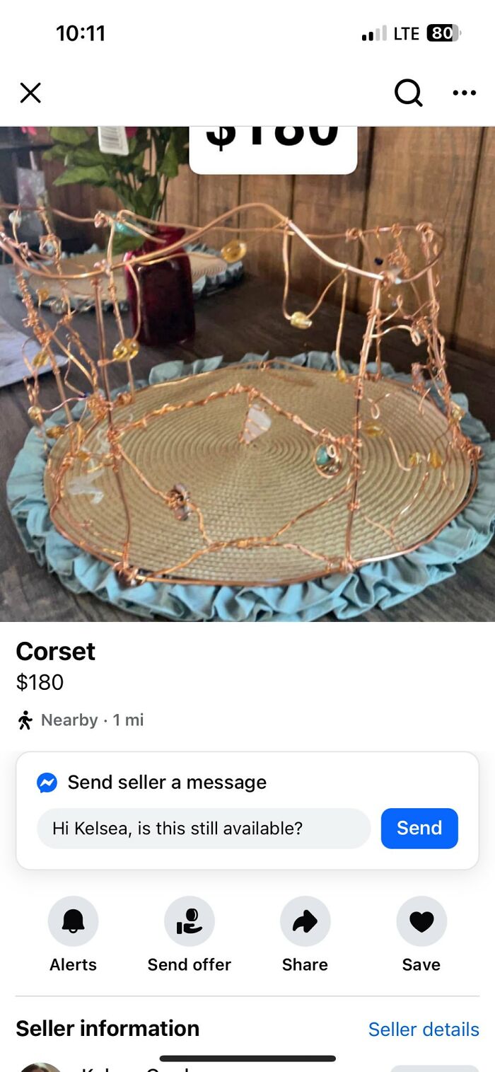 Handmade wire corset DIY project with beads on woven base and blue fabric trim displayed for sale at 180 dollars.