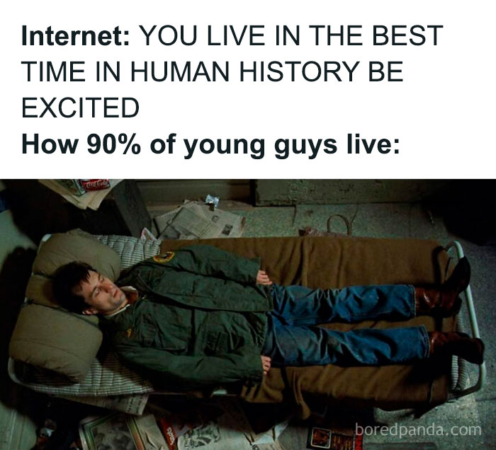 Young man lying on a bed in a cluttered room, illustrating a random Gen-Z meme about modern life perception.