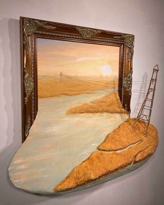 Three-dimensional nature scene blending painting and sculpture with a river, field, and power lines by a Brooklyn artist.