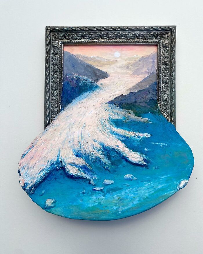 Framed nature scene where painting meets sculpture showing a river flowing out from the canvas in blue and white hues.