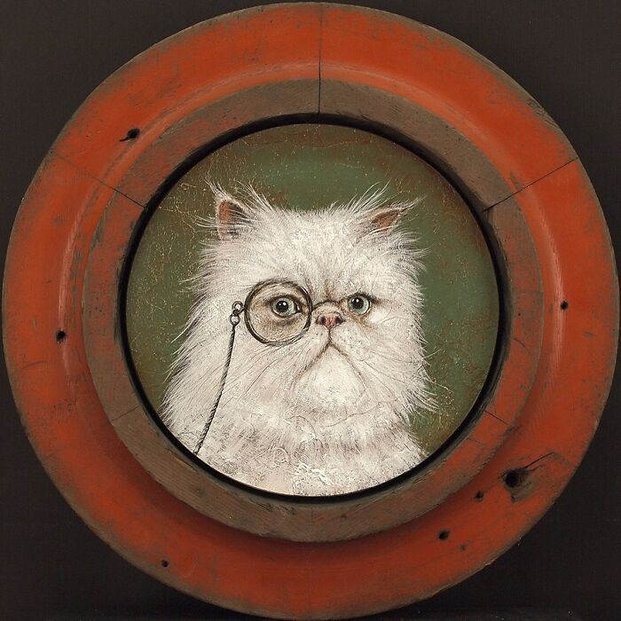 Surreal animal painting of a white cat wearing a monocle inside a rustic round orange frame with a dark background.