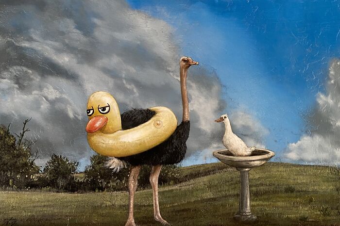 Surreal animal painting of an ostrich wearing a duck float with a small white bird on a birdbath in a dreamy landscape.