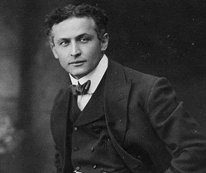 Portrait of a well-dressed man from history showcasing famous names known for being good looking in vintage style.