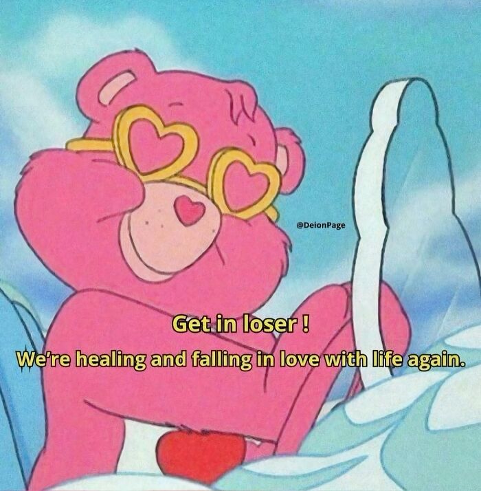 Pink bear wearing heart-shaped sunglasses with caption about healing and falling in love, cute and wholesome posts theme.