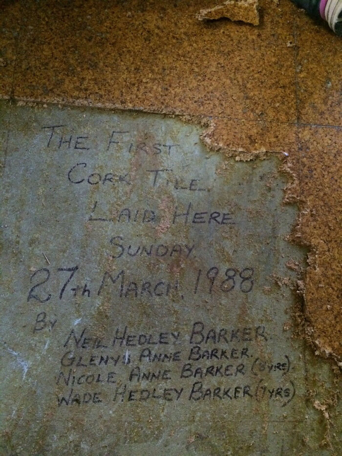 Old cork tile with handwritten note dated 1988, a cool thing found buried and hidden in an old house floor.