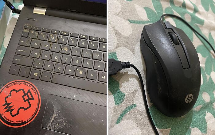 Worn-out laptop keyboard and scratched HP mouse showing damage to borrowed computer accessories.