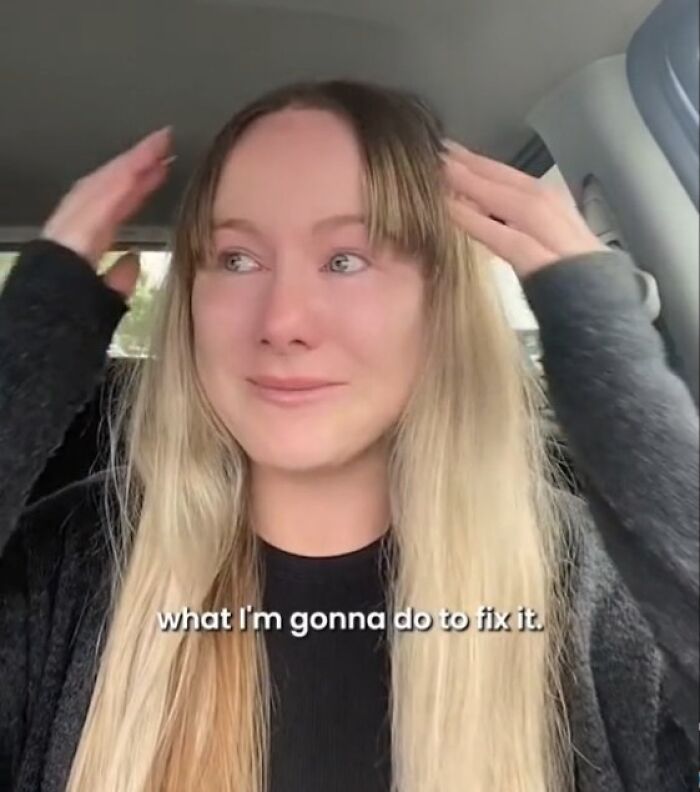 Young woman with uneven blonde hair looking upset in car, illustrating hair fails people got versus what they asked for.