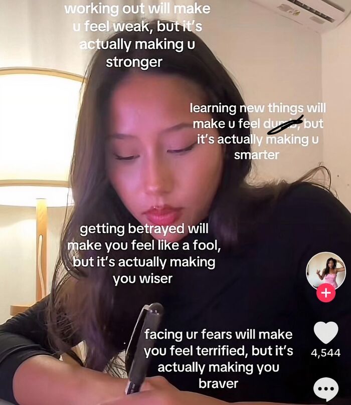 Young woman writing with motivational text overlaid about strength, wisdom, and bravery in a cute and wholesome post.