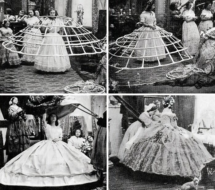 Victorian times fashion showing women wearing crinoline hoop skirts and elaborate dresses indoors.