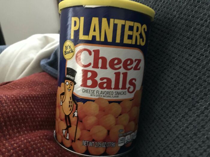 Planters Cheez Balls canister with mascot Mr. Peanut on a couch, a beloved snack that disappeared and returned.
