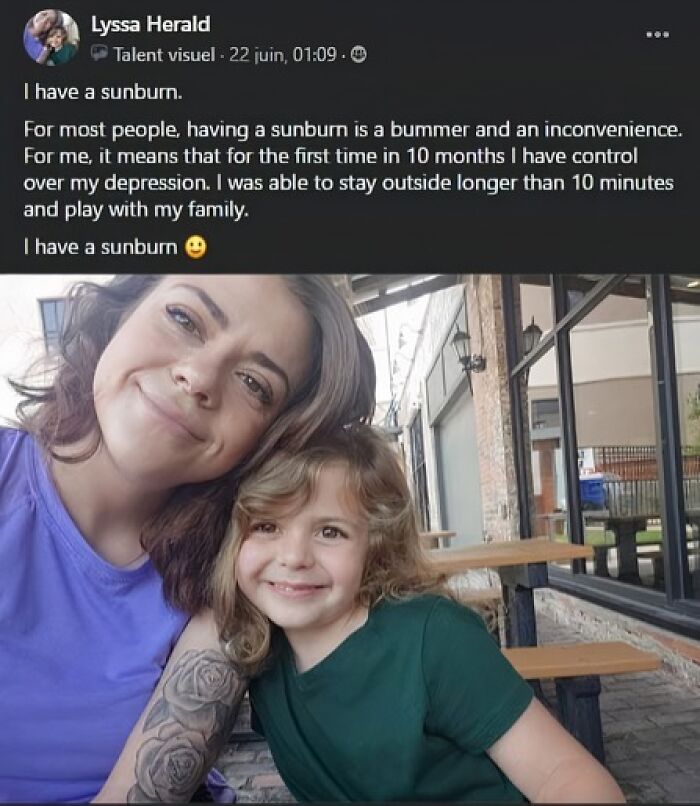 Woman and child smiling outdoors, sharing a moment that reflects daily serotonin boost from positive experiences.