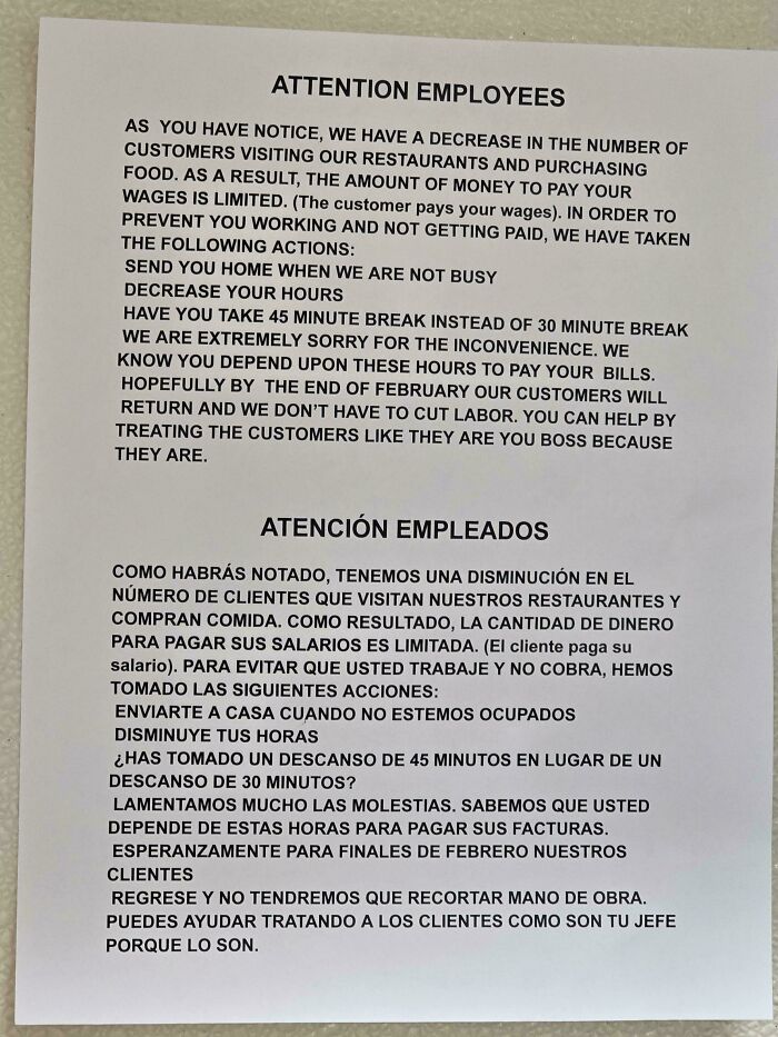 Workplace notice in English and Spanish explaining pay cuts and reduced hours in a toxic work environment.