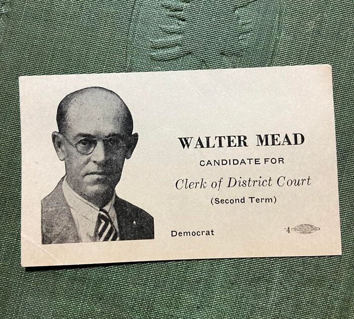 Vintage black and white photo of a man on an old political card found in hidden places in people’s homes wall.