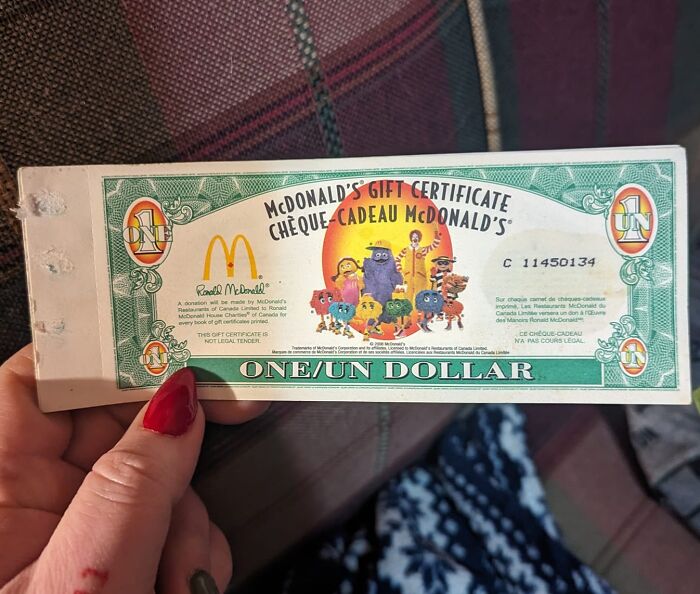 McDonald's gift certificate found hidden in walls, an unexpected item discovered in homes and secret spaces.
